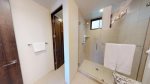 Walk-in tiled shower and private water closet
